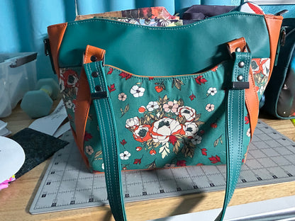 Teal Flowers Hireath Handbag